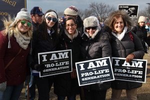 Hanna O'Neill, Mary Kate O'Sullivan, Victoria Rouse, Cathy O'Sullivan, and Lorraine Levano bear witness for the pre-born babies.